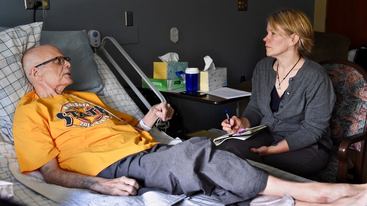 Death Doula offering emotional and physical support to a patient