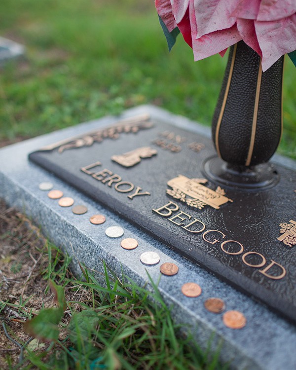 coins on headstones